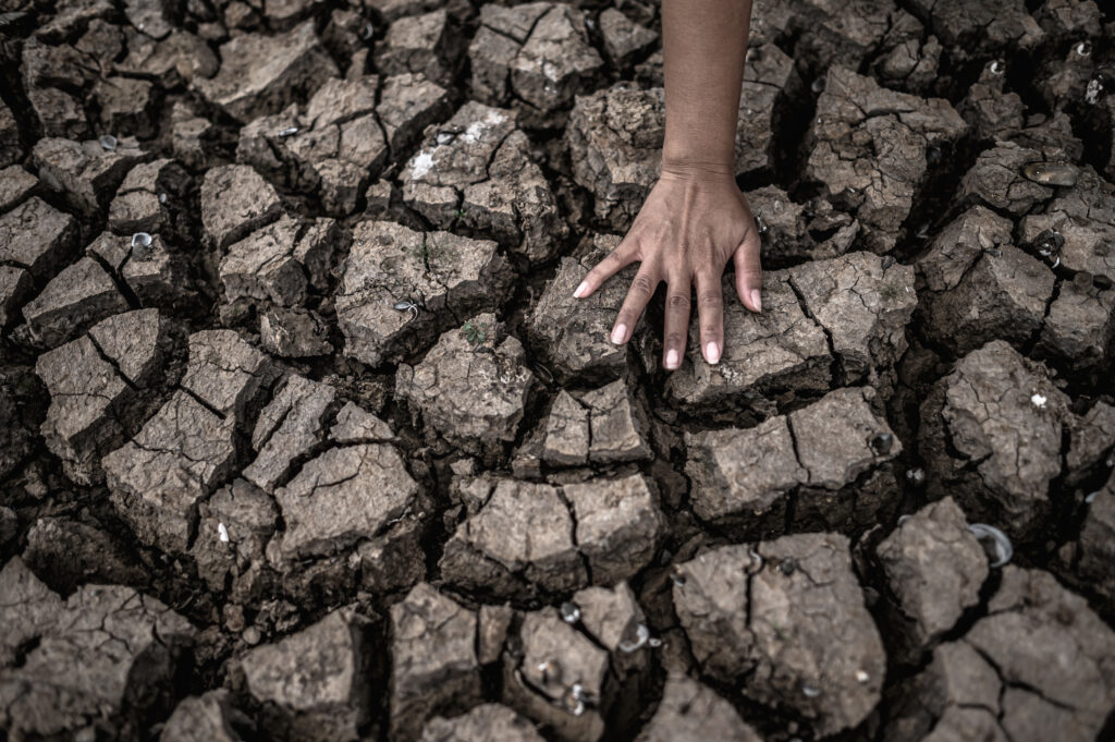 hands dry ground global warming water crisis 1